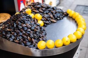 Stuffed mussels with lemon - street food in Istanbul, Turkey